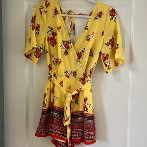 NWT Miami Size Small Yellow Floral Romper from Francesca’s